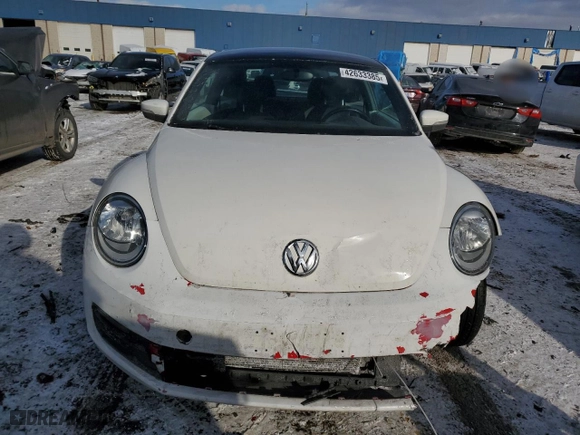 2012 Volkswagen Beetle 2.5L w/Sun/Sound/Nav PZEV with VIN 3VWHP7AT3CM627340, listed as a Copart auction lot 42633385 with 115,862 mi miles and Salvage Title. Bid and sale history available at carsss.com. Image 5.