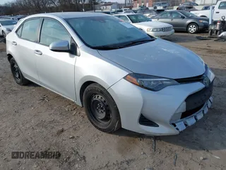 2019 Toyota Corolla L with VIN 2T1BURHE7KC223002, listed as a IAAI auction lot 41371130 with 251,534 mi miles. Bid and sale history available at carsss.com. Image 1.