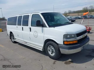 2013 Chevrolet Express Passenger 1LT with VIN 1GAZG1FA1D1191719, listed as a IAAI auction lot 42124977 with 92,228 mi miles. Bid and sale history available at carsss.com. Image 1.
