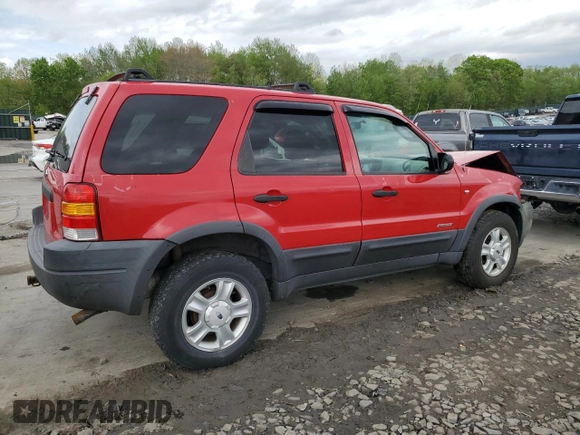 2002 Ford Escape XLT Choice with VIN 1FMCU04132KB16848, listed as a Copart auction lot 55266595 with 205,451 mi miles and Salvage title. Bid and sale history available at DreamBid. Image 3.