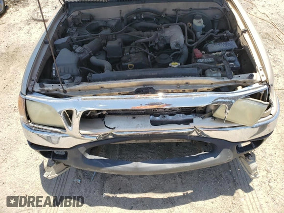 2003 Toyota Tacoma z VIN 5TEVL52N23Z253151, wystawiony jako Copart lot #58293555 z przebiegiem 266 250 mil mil oraz Szkoda całkowita • Salvage title. Historia ofert i sprzedaży dostępna na DreamBid. Obrazek 11.