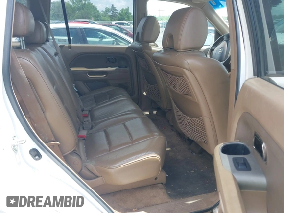 2007 Honda Pilot EX-L z VIN 5FNYF18627B024506, wystawiony jako IAAI lot #42220694 z przebiegiem 258 535 mil mil oraz . Historia ofert i sprzedaży dostępna na DreamBid. Obrazek 8.