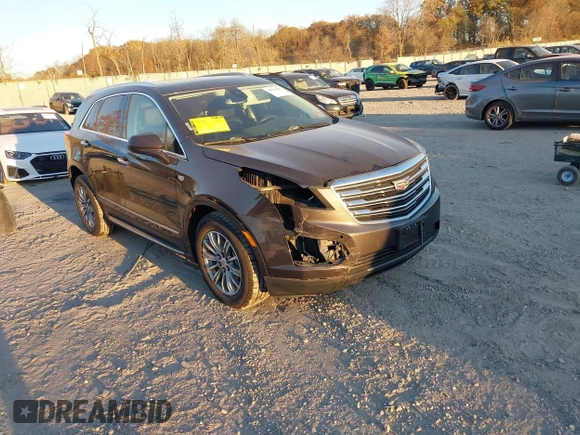2017 Cadillac XT5 Luxury AWD with VIN 1GYKNDRS5HZ319787, listed as a IAAI auction lot 40819077 with 83,510 mi miles and . Bid and sale history available at DreamBid. Image 1.