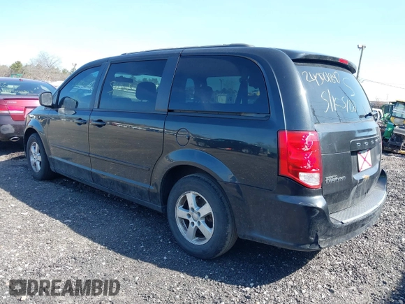 2013 Dodge Grand Caravan SXT with VIN 2C4RDGCG1DR626827, listed as a IAAI auction lot 38984754 with 224,487 mi miles and . Bid and sale history available at DreamBid. Image 3.