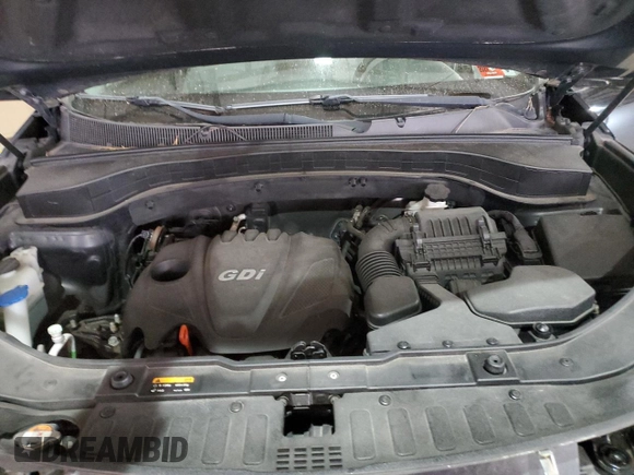 2015 Kia Sorento LX z VIN 5XYKTCA69FG593865, wystawiony jako Copart lot #49466205 z przebiegiem 128 270 mil mil oraz Szkoda całkowita • Salvage title. Historia ofert i sprzedaży dostępna na DreamBid. Obrazek 12.