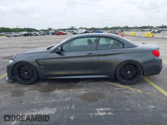 2016 BMW M4 with VIN WBS3U9C51GP968602, listed as a IAAI auction lot 42442452 with 3 mi miles and . Bid and sale history available at DreamBid. Image 14.