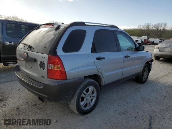 2005 Kia Sportage LX with VIN KNDJF723457132535, listed as a Copart auction lot 52460445 with 180,110 mi miles and Salvage Title. Bid and sale history available at carsss.com. Image 3.