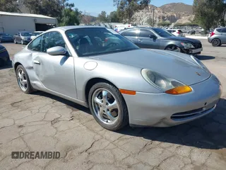 1999 Porsche 911 with VIN WP0AA2999XS620309, listed as a IAAI auction lot 42061632 with 99,605 mi miles and . Bid and sale history available at DreamBid. Image 1.