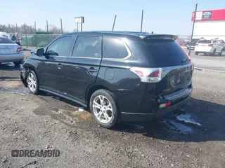 2014 Mitsubishi Outlander GT with VIN JA4JZ4AX8EZ016070, listed as a IAAI auction lot 41771934 with 157,724 mi miles and . Bid and sale history available at DreamBid. Image 3.