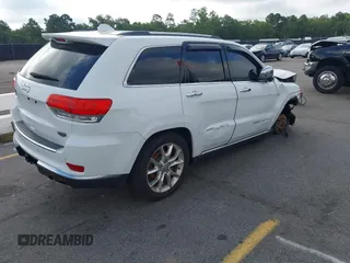 2014 Jeep Grand Cherokee Summit with VIN 1C4RJFJT2EC501235, listed as a IAAI auction lot 42622790 with 160,000 mi miles and . Bid and sale history available at DreamBid. Image 4.