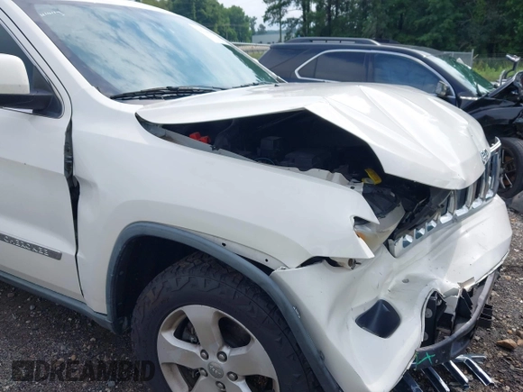 2011 Jeep Grand Cherokee Laredo with VIN 1J4RR4GG7BC701007, listed as a IAAI auction lot 42704995 with 145,956 mi miles and . Bid and sale history available at DreamBid. Image 13.