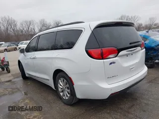 2017 Chrysler Pacifica Touring L with VIN 2C4RC1BG4HR583463, listed as a IAAI auction lot 41487599 with 180,459 mi miles and . Bid and sale history available at DreamBid. Image 3.