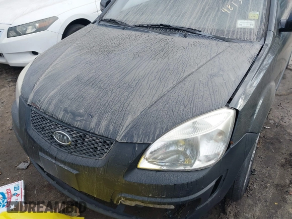 2009 Kia Rio LX with VIN KNADE243296481394, listed as a IAAI auction lot 41498863 with 59,222 mi miles. Bid and sale history available at carsss.com. Image 6.