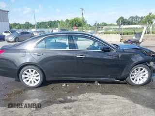 2014 Cadillac CTS RWD with VIN 1G6AP5SX9E0134183, listed as a IAAI auction lot 42190674 with 59,603 mi miles and . Bid and sale history available at DreamBid. Image 14.