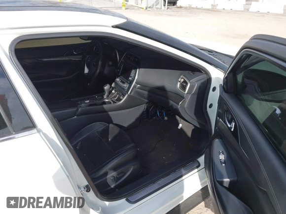 2019 Nissan Maxima SV with VIN 1N4AA6AV7KC383974, listed as a IAAI auction lot 41660286 with 86,682 mi miles and . Bid and sale history available at DreamBid. Image 5.