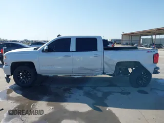 2016 Chevrolet Silverado 1500 LT with VIN 3GCUKREC8GG366278, listed as a IAAI auction lot 41993038 with 176,515 mi miles and . Bid and sale history available at DreamBid. Image 14.