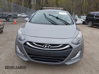 2014 Hyundai Elantra GT with VIN KMHD35LH6EU165019, listed as a IAAI auction lot 42016057 with 121,794 mi miles. Bid and sale history available at carsss.com. Image 12.