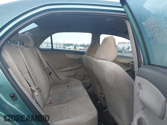 2009 Toyota Corolla with VIN JTDBL40E099063708, listed as a IAAI auction lot 42085584 with 110,075 mi miles. Bid and sale history available at carsss.com. Image 8.