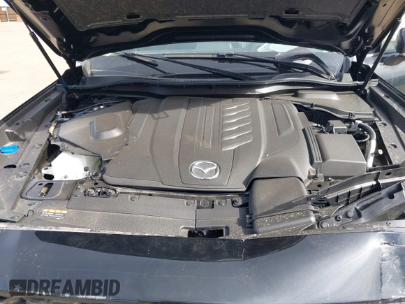 2025 Mazda CX-90 Premium Sport z VIN JM3KKCHD1S1221462, wystawiony jako IAAI lot #41765034 z przebiegiem Nie podano mil oraz . Historia ofert i sprzedaży dostępna na DreamBid. Obrazek 10.