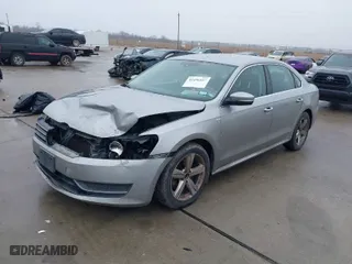 2014 Volkswagen Passat Wolfsburg Ed with VIN 1VWAT7A32EC028320, listed as a IAAI auction lot 41456457 with 173,581 mi miles. Bid and sale history available at carsss.com. Image 2.