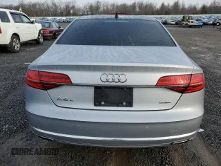 2015 Audi A8 3.0T z VIN WAU3GAFD7FN008548, wystawiony jako Copart lot #50428525 z przebiegiem 128 457 mil mil oraz Czysty tytuł • Clean title. Historia ofert i sprzedaży dostępna na DreamBid. Obrazek 6.