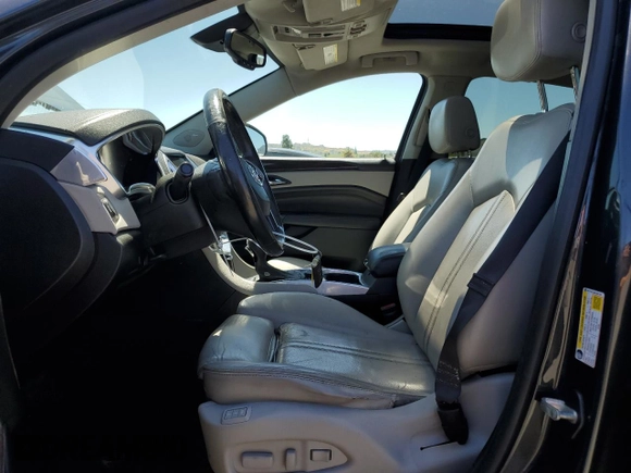 2014 Cadillac SRX Performance Collection z VIN 3GYFNCE36ES687267, wystawiony jako Copart lot #58242255 z przebiegiem 167 577 mil mil oraz Szkoda całkowita • Salvage title. Historia ofert i sprzedaży dostępna na DreamBid. Obrazek 7.