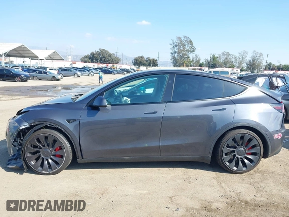 2023 Tesla Model Y Performance with VIN 7SAYGDEF5PF823122, listed as a IAAI auction lot 41546480 with 12,943 mi miles and . Bid and sale history available at DreamBid. Image 13.