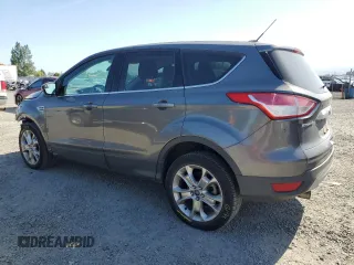 2013 Ford Escape SEL с VIN 1FMCU9HX3DUB16164, выставлен на аукционе Copart как лот 56211675 с пробегом 79 975 миль миль и Списание • Salvage title. История ставок и продаж доступна на DreamBid. Изображение 2.