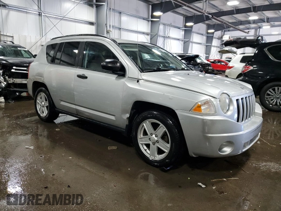 2007 Jeep Compass Sport with VIN 1J8FT47W37D123838, listed as a Copart auction lot 45653355 with 152,337 mi miles and Salvage Title. Bid and sale history available at carsss.com. Image 4.