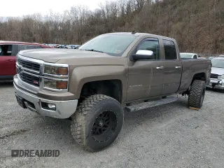 2014 Chevrolet Silverado 1500 LTZ with VIN 1GCVKSEC0EZ140325, listed as a Copart auction lot 52954845 with 128,231 mi miles and Salvage Title. Bid and sale history available at DreamBid. Image 1.