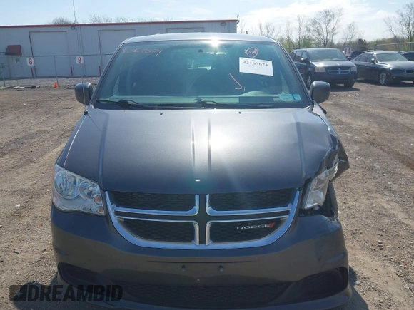 2015 Dodge Grand Caravan SE with VIN 2C4RDGBG2FR684367, listed as a IAAI auction lot 42167621 with 216,628 mi miles and . Bid and sale history available at DreamBid. Image 12.