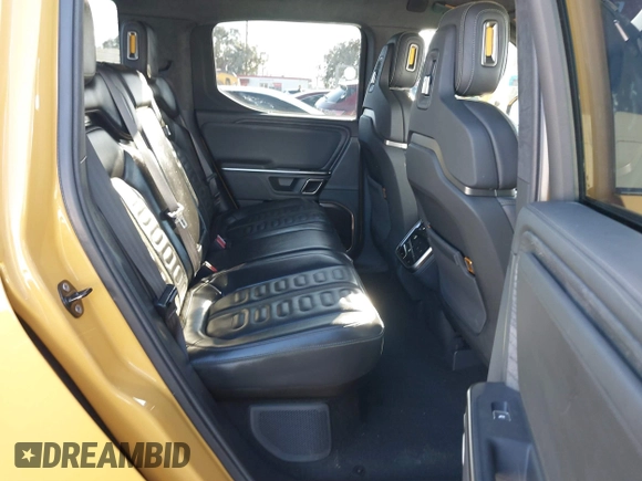 2022 Rivian R1T Adventure Package with VIN 7FCTGAAA2NN005811, listed as a IAAI auction lot 41706558 with 21,336 mi miles. Bid and sale history available at carsss.com. Image 8.