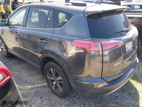 2018 Toyota RAV4 XLE with VIN JTMWFREV4JJ168138, listed as a IAAI auction lot 41845337 with 122,509 mi miles. Bid and sale history available at carsss.com. Image 3.