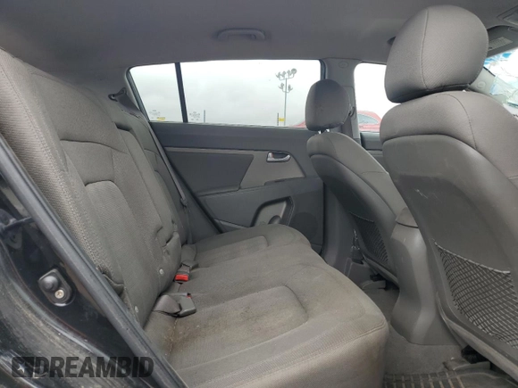 2013 Kia Sportage LX z VIN KNDPBCA25D7450010, wystawiony jako Copart lot #54597815 z przebiegiem 110 980 mil mil oraz Czysty tytuł • Clean title. Historia ofert i sprzedaży dostępna na DreamBid. Obrazek 11.
