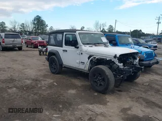 2021 Jeep Wrangler Sport S with VIN 1C4GJXAN6MW677281, listed as a IAAI auction lot 40814351 with 55,360 mi miles and . Bid and sale history available at DreamBid. Image 1.