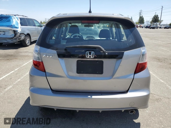 2010 Honda Fit Sport with VIN JHMGE8H69AS025801, listed as a Copart auction lot 58416375 with 216,216 mi miles and Clean title. Bid and sale history available at DreamBid. Image 6.