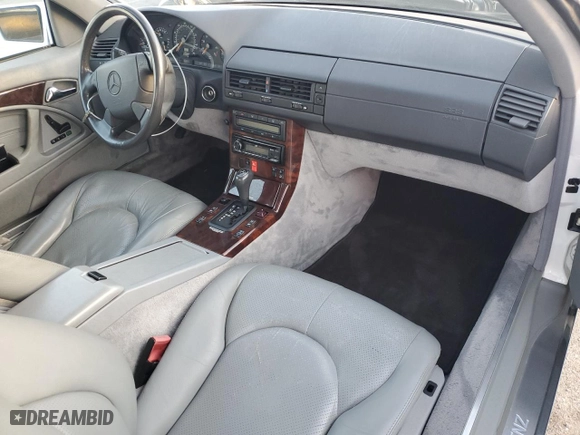 1997 Mercedes-Benz SL-Class with VIN WDBFA63F5VF143197, listed as a Copart auction lot 45003735 with 100,250 mi miles and Salvage Title. Bid and sale history available at carsss.com. Image 8.