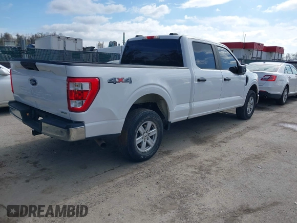 2021 Ford F-150 XL with VIN 1FTFW1E82MKD23506, listed as a IAAI auction lot 41876760 with 71,387 mi miles. Bid and sale history available at carsss.com. Image 4.