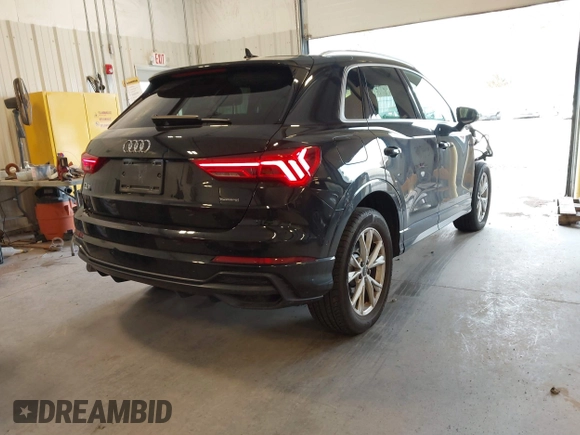 2021 Audi Q3 S line Premium Plus with VIN WA1EECF32M1054629, listed as a IAAI auction lot 41588322 with 33,385 mi miles and . Bid and sale history available at DreamBid. Image 4.