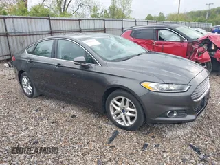 2015 Ford Fusion SE z VIN 3FA6P0HD3FR191778, wystawiony jako IAAI lot #42118627 z przebiegiem 108 642 mil mil oraz . Historia ofert i sprzedaży dostępna na DreamBid. Obrazek 1.