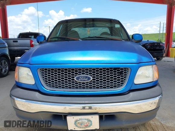 1999 Ford F-150 XL with VIN 1FTRX17L9XNB83680, listed as a IAAI auction lot 42636807 with Not provided miles and . Bid and sale history available at DreamBid. Image 12.
