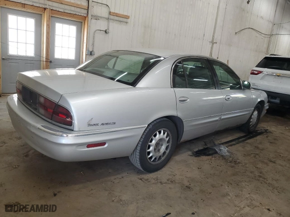 1999 Buick Park Avenue with VIN 1G4CW52K3X4626048, listed as a Copart auction lot 49991565 with 210428 miles and Salvage Title. Bid and sale history available at carsss.com. Image 3.