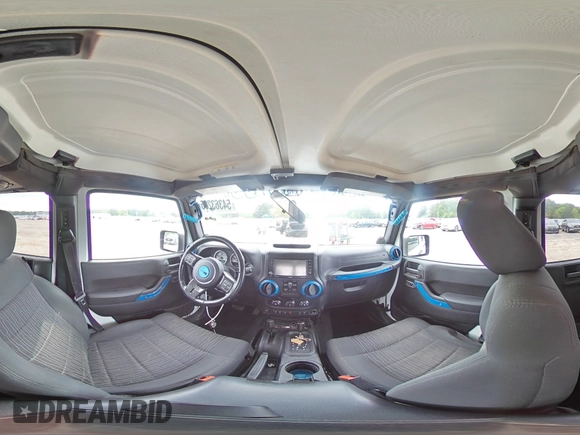 2012 Jeep Wrangler Unlimited Sahara with VIN 1C4HJWEG8CL126053, listed as a Copart auction lot 54363285 with 88,014 mi miles and Salvage title. Bid and sale history available at DreamBid. Image 14.