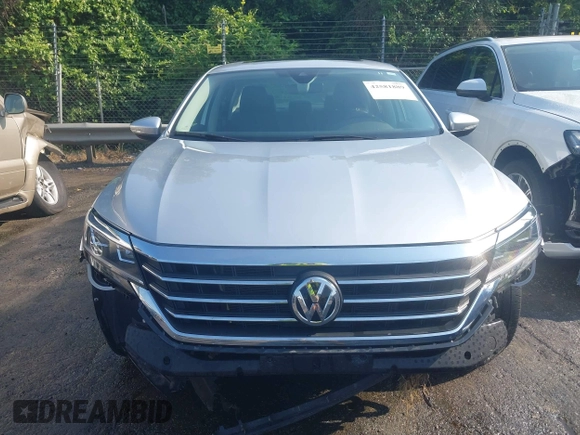 2021 Volkswagen Passat SE with VIN 1VWSA7A38MC012907, listed as a IAAI auction lot 42581889 with 76,001 mi miles and . Bid and sale history available at DreamBid. Image 13.