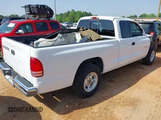 2000 Dodge Dakota z VIN 1B7GL22X6YS732984, wystawiony jako IAAI lot #42261357 z przebiegiem 77 615 mil mil oraz . Historia ofert i sprzedaży dostępna na DreamBid. Obrazek 4.