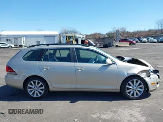 2014 Volkswagen Jetta SportWagen TDI with VIN 3VWPL7AJ8EM610672, listed as a IAAI auction lot 41811091 with 129,554 mi miles. Bid and sale history available at carsss.com. Image 13.