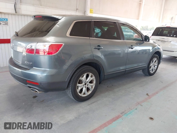 2011 Mazda CX-9 Touring with VIN JM3TB2CA8B0318305, listed as a IAAI auction lot 42114546 with 207,895 mi miles and . Bid and sale history available at DreamBid. Image 4.