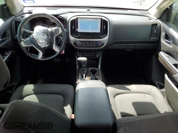 2015 GMC Canyon 2WD SLE with VIN 1GTG5BE32F1233430, listed as a Copart auction lot 47898925 with 59,149 mi miles and Salvage Title. Bid and sale history available at DreamBid. Image 8.