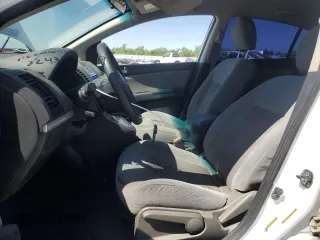 2010 Nissan Sentra S with VIN 3N1AB6AP5AL722326, listed as a Copart auction lot 57353355 with 124,717 mi miles and Salvage title. Bid and sale history available at DreamBid. Image 7.