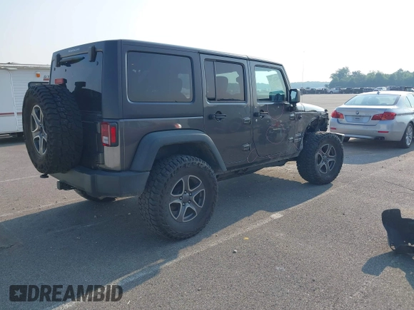 2018 Jeep Wrangler Unlimited Sport S with VIN 1C4BJWDG6JL854359, listed as a IAAI auction lot 42423170 with 84,470 mi miles and . Bid and sale history available at DreamBid. Image 4.